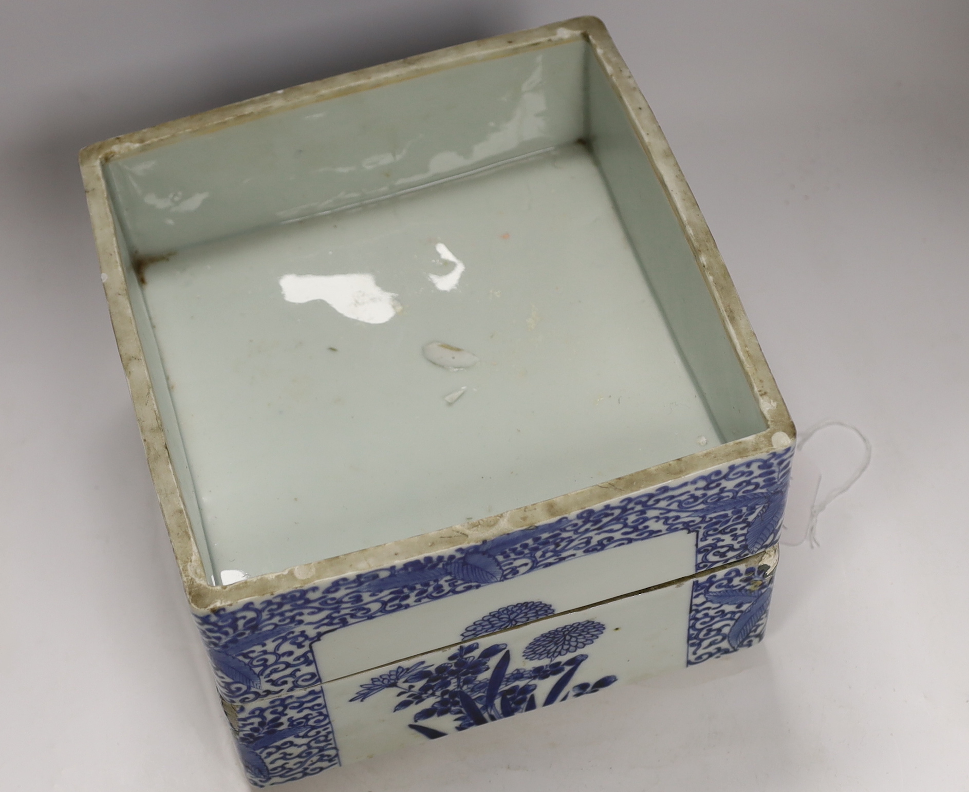 A Japanese blue and white floral, two tier food container with cover, 23cm high